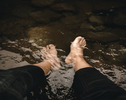 A person relaxing outdoors in nature